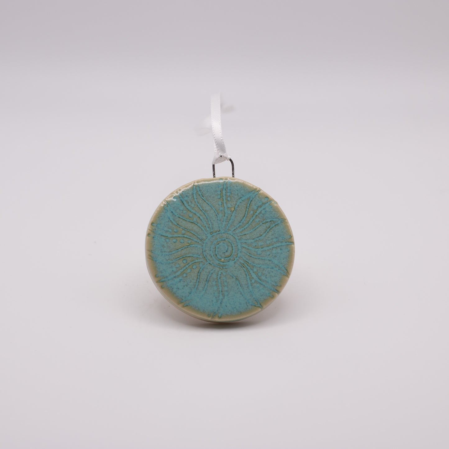 Carved Disc Ornament- Light Turquoise Sunburst